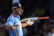 Indian cricket team captain Mahendra Sing Dhoni celebrates after hitting a boundary for six runs to seal their victory during the final match of the Tri-Nation series between India and Sri Lanka at the Queen's Park Oval stadium in Port of Spain on July 11, 2013. India defeated Sri Lanka by 1 wicket to win the series. AFP PHOTO/Jewel Samad        (Photo credit should read JEWEL SAMAD/AFP/Getty Images)